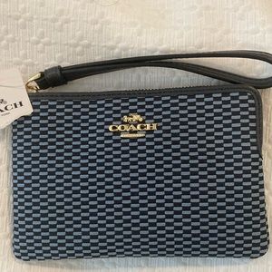 Coach small wristlet 
Fabric blue and navy pattern